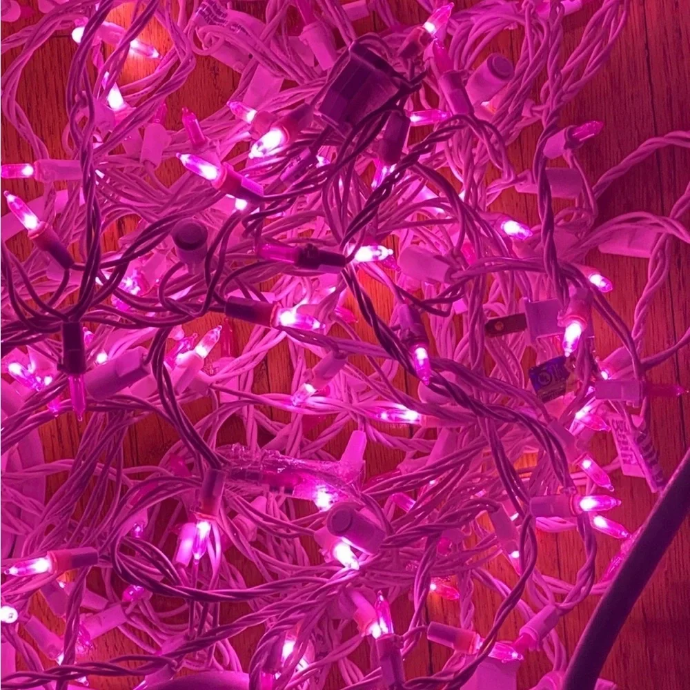 Pink string lights One set Aprx 16 feet long Aprx 50 lights per string